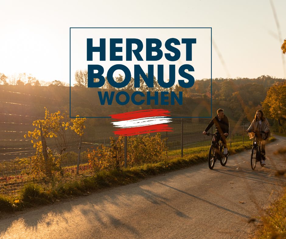 Bewerbung Herbstbonus-Wochen mit herbstlicher Stimmung in den Weinbergen mit 2 Radfahrern
